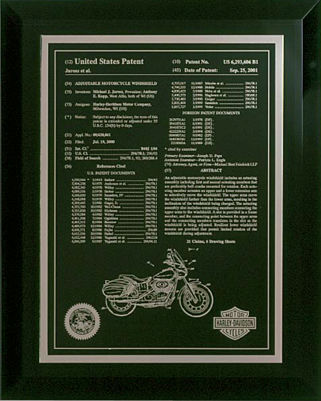 Framed patent illustration of a Harley-Davidson motorcycle from 1976.